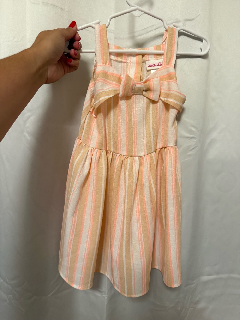 Little Lass Peach and Cream Striped Bow Dress with diaper cover